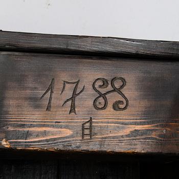 A Baroque chest, dated 1788.