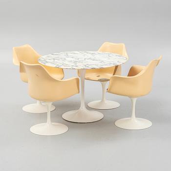 Eero Saarinen, four "Tulip" chairs, Knoll International, and a table.