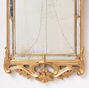 A Rococo giltwood mirror by N. Meunier (master in Stockholm 1754-97).