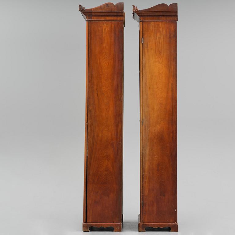 A pair of late Empire mahogany book cabinets, Stockholm, 1820/30's.