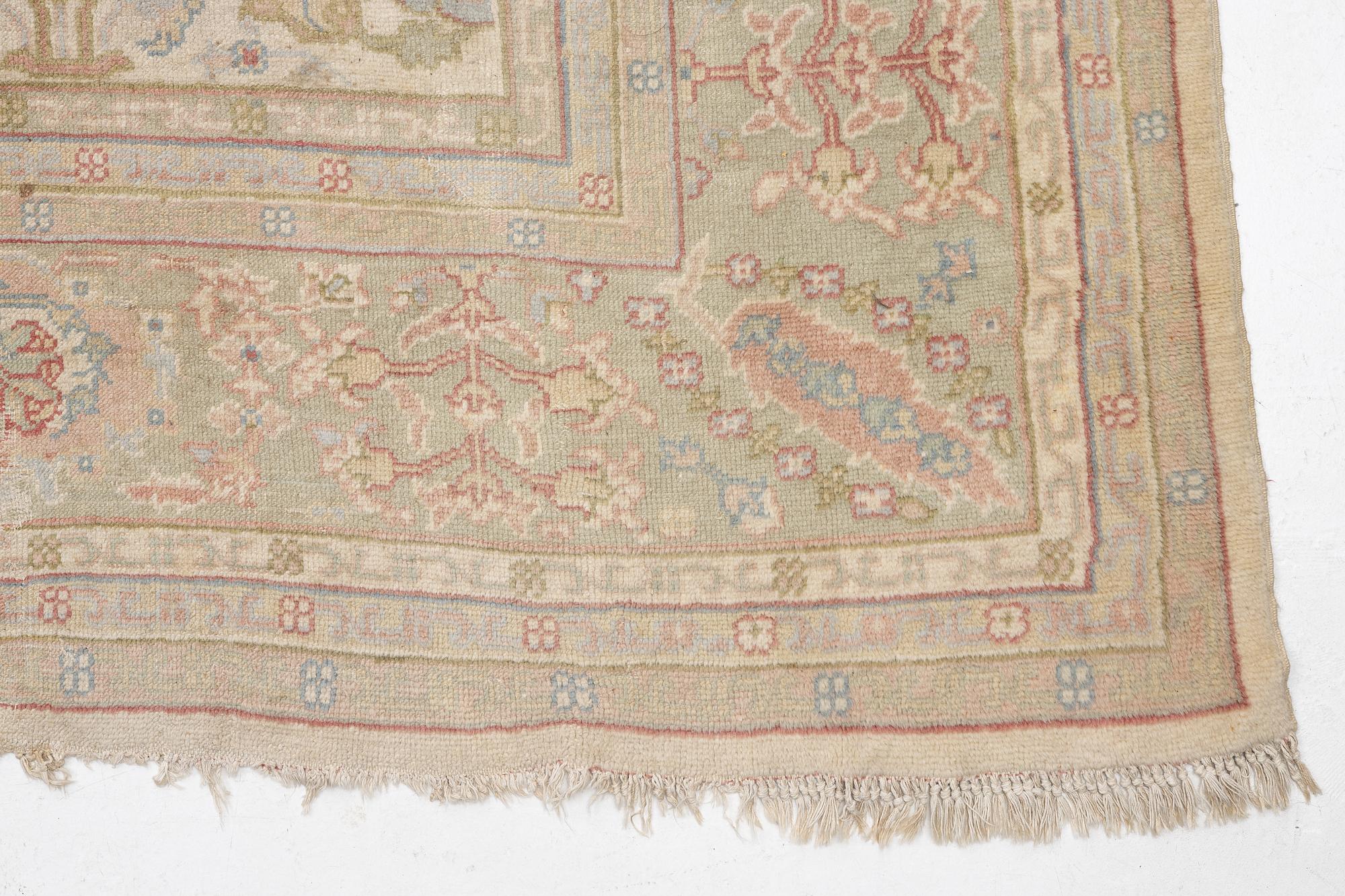 An antique Ushak carpet, West Anatolia, c. 486 x 391 cm.