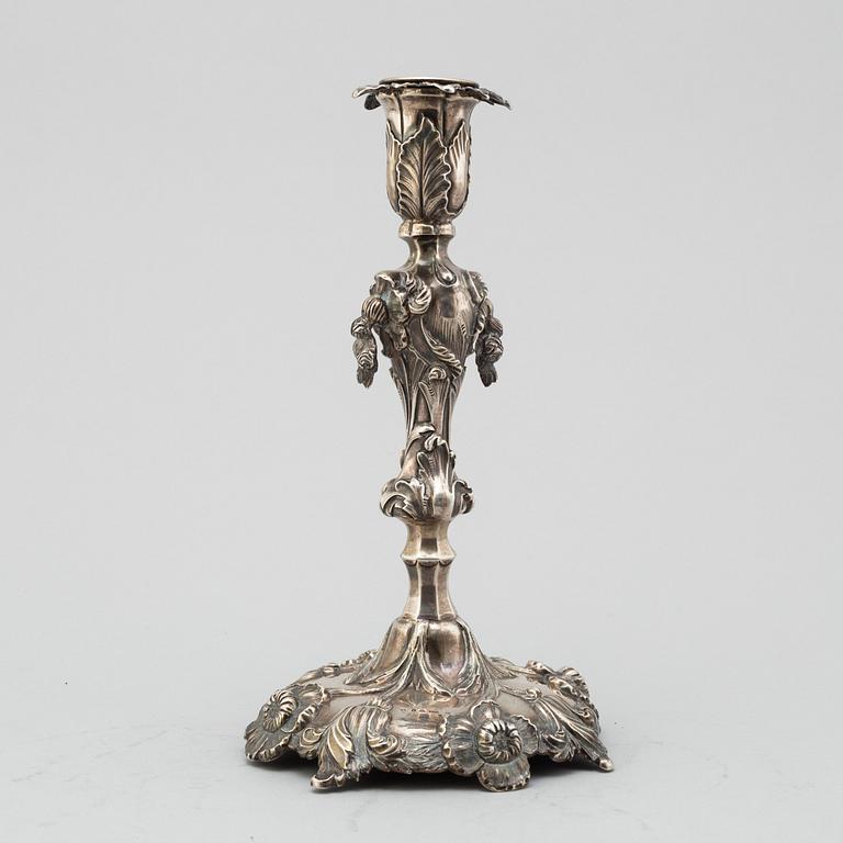 GUSTAF MÖLLENBORG, a silver candlestick dated 1853.