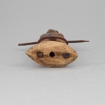 A wooden tool/sculpture, ca 1850.