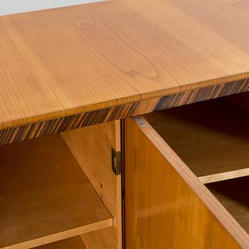 A "MODEL OK" SIDEBOARD DESIGNED BY AXEL EINAR HJORTH FOR NORDISKA KOMPANIET.