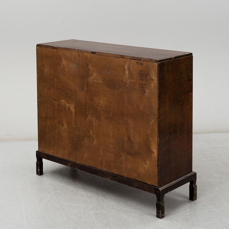 A 1930s cabinet by E. Pettersson, Gefle, Sweden.