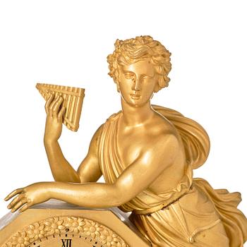 A French Empire ormolu and patinated bronze mantel clock, Paris, early 19th century.