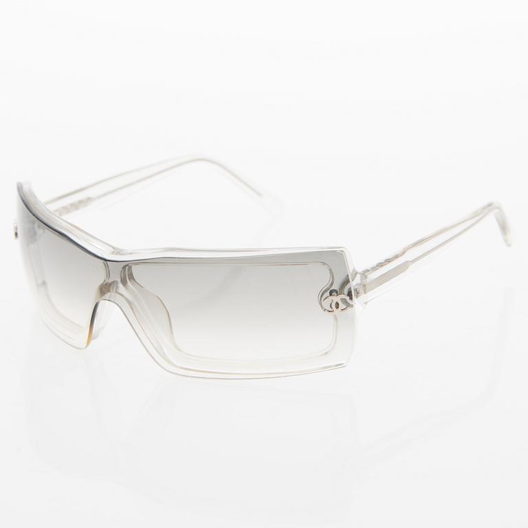 A Pair of Model 5067 Sunglasses.