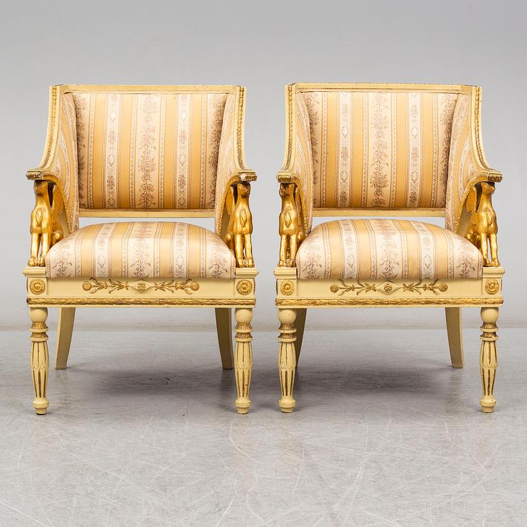 A pair of late Gustavian style armchairs, circa 1900.