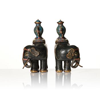 A pair of Chinese cloisonné and chamleve caparisoned elephants, Qing dynasty, 18th/19th Century.