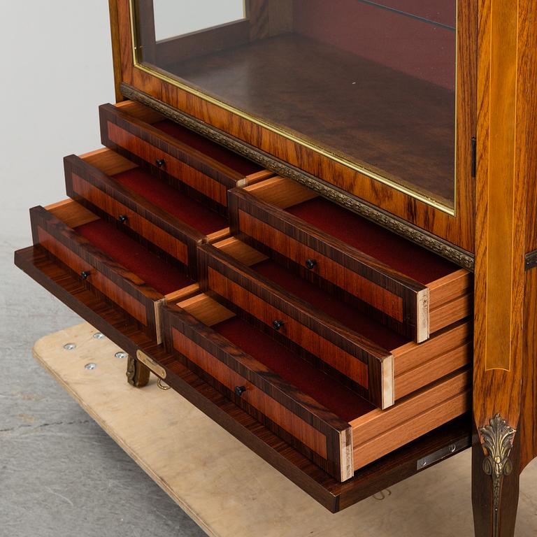 A Louis-XVI style display cabinet, third quarter of 20th century.