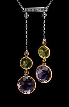 502. A PAIR OF EARRINGS AND A NECKLACE, amethysts, peridotes and brilliant cut diamonds c. 0.17 ct. Weight 9,5 g.
