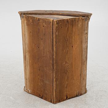 A corner hanging cabinet, dated 1844.