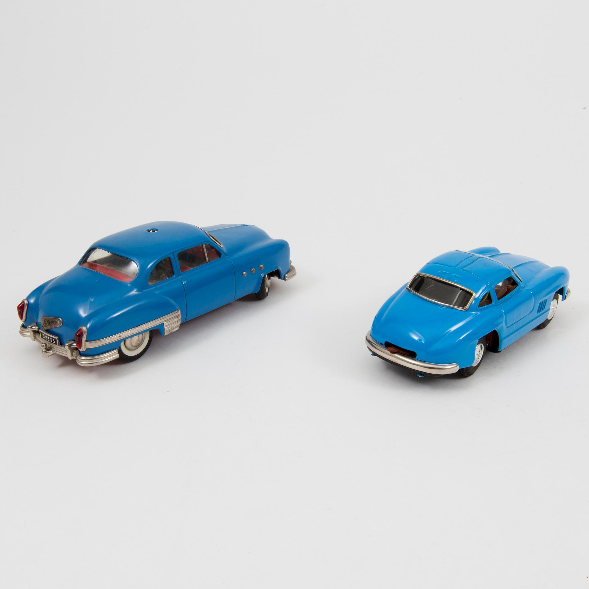 Two tinplate cars by Schuco and Kato Sairen German and Japan 1950s.