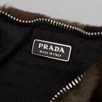 A ponyhair clutch by Prada.