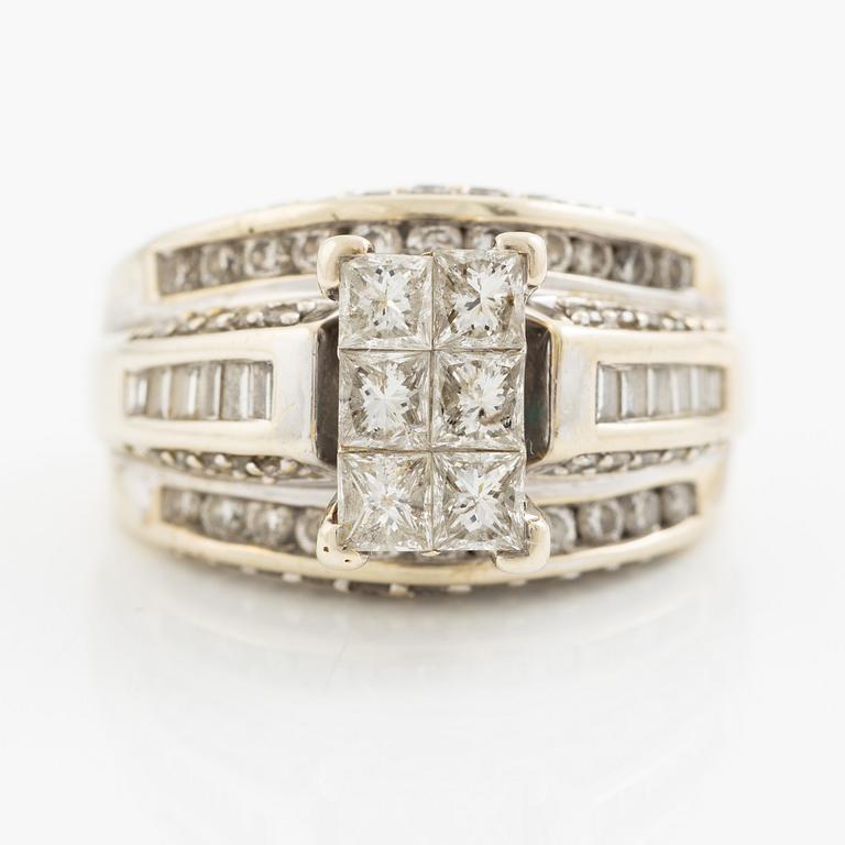 Ring, 14K gold with princess, baguette, and round brilliant-cut diamonds.