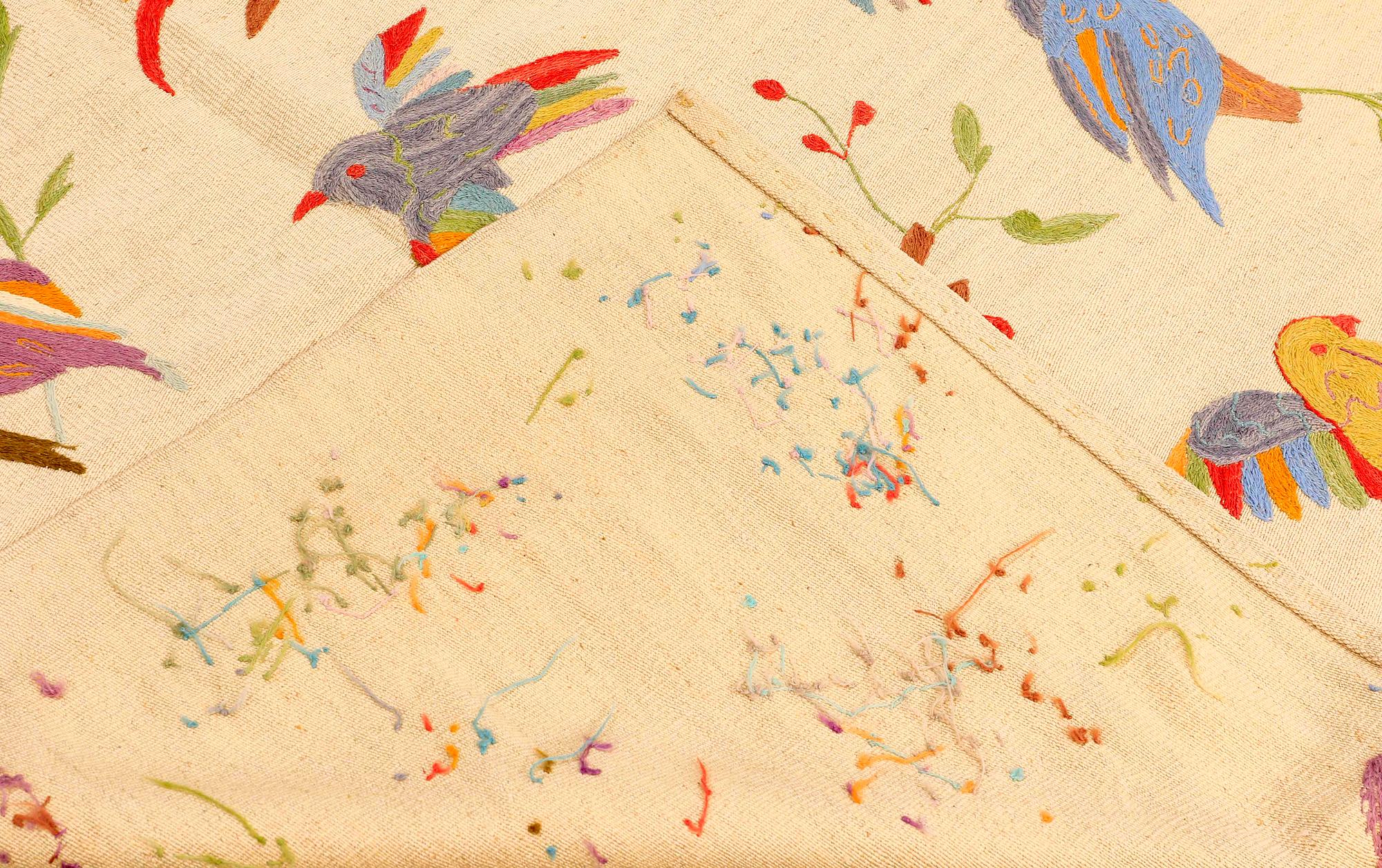An embroided flat weave, ca 199 x 144 cm.