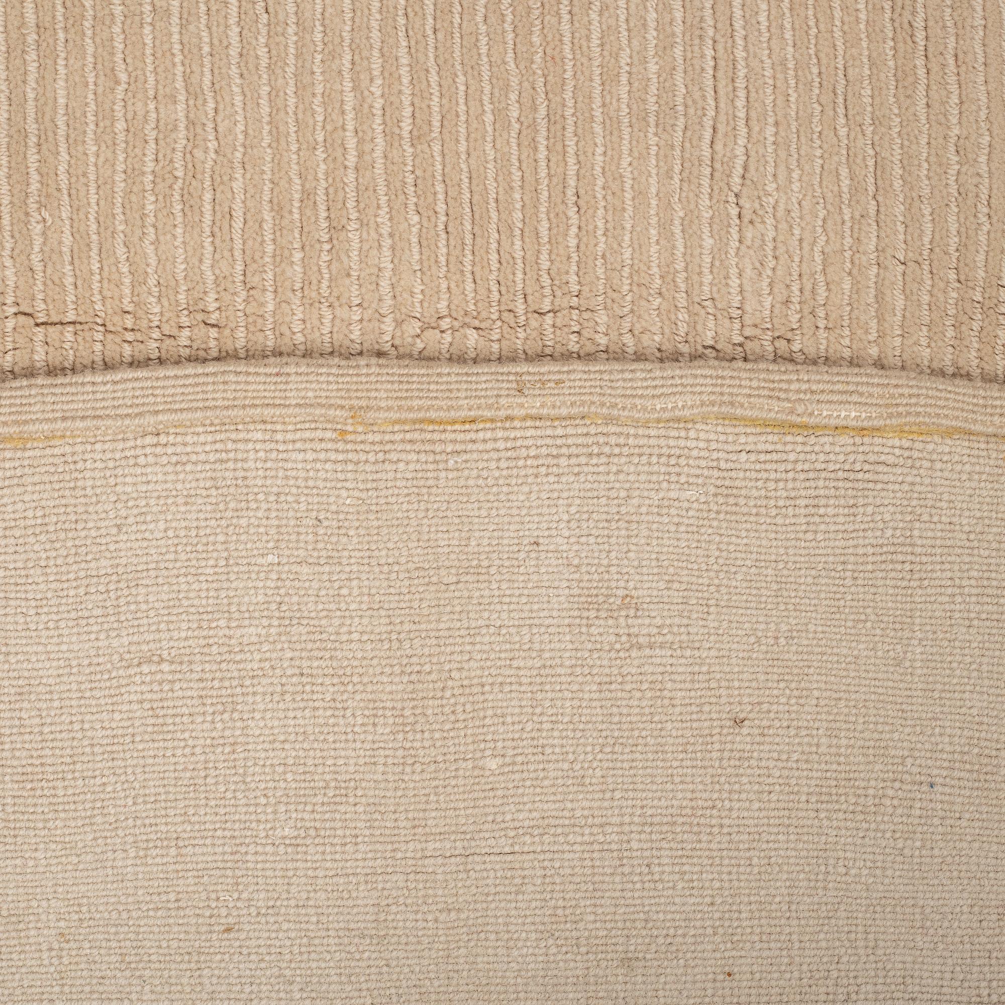 A CARPET, loomed, India, ca 275 x 200 cm.