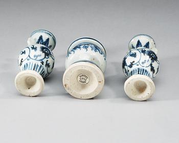 A three piece blue and white altar garniture, Ming dynasty.