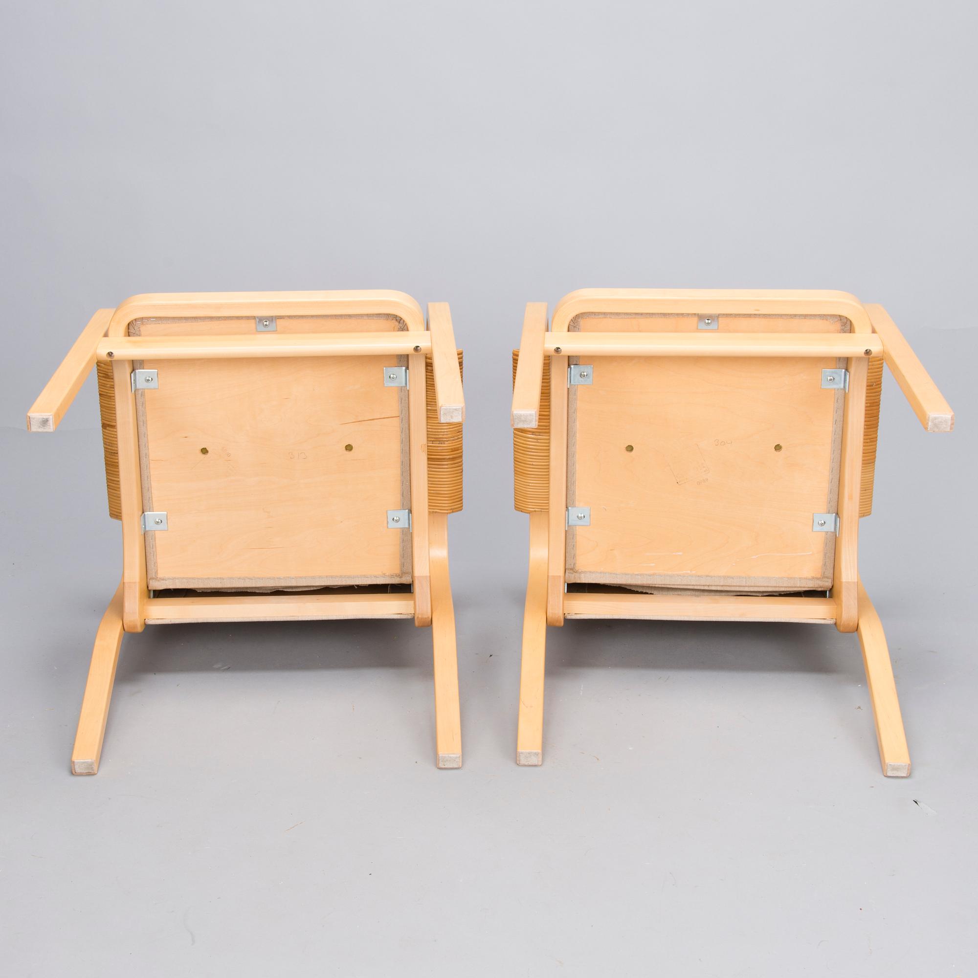 ALVAR AALTO, Pair of model 'E45' armchairs for Artek, late 20th Century.