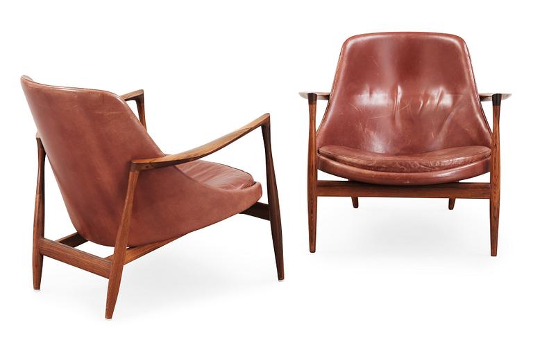 A pair of Ib Kofod Larsen palisander and brown leather 'Elisabeth' easy chairs, Christensen & Larsen, Denmark 1950-60's.