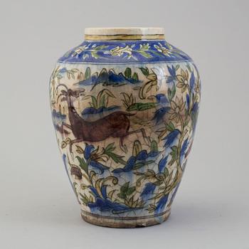 A POTTERY URN, probably late Qajar dynasty, Persia/Iran, height ca 27,5 cm.