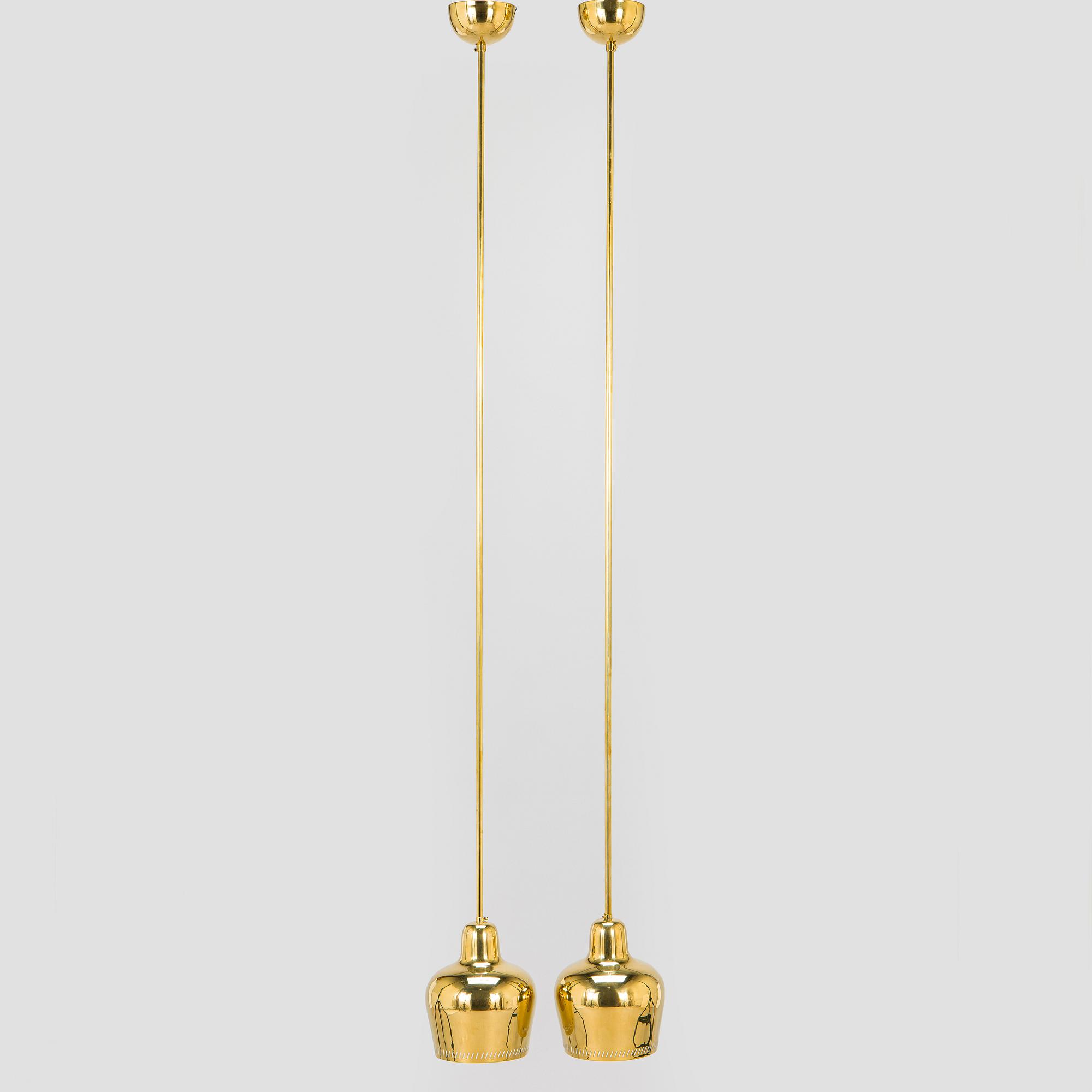 Paavo Tynell, a pair of mid 20th century ceiling lights, model 1699, for Taito / Idman.