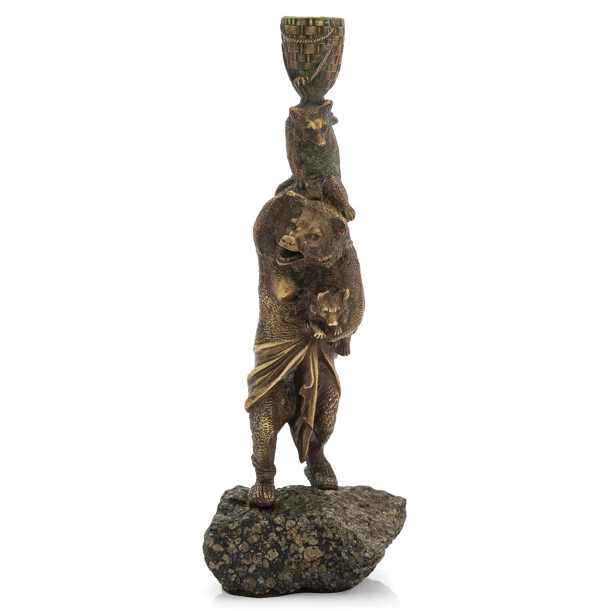 A Russian bronze candle holder, circa 1900.