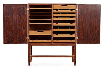 A Carl-Axel Acking palisander cabinet, Nordiska Kompaniet (NK) 1940's-50's.