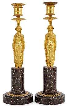 610. A pair of late Gustavian circa 1800 porphyry candlesticks.
