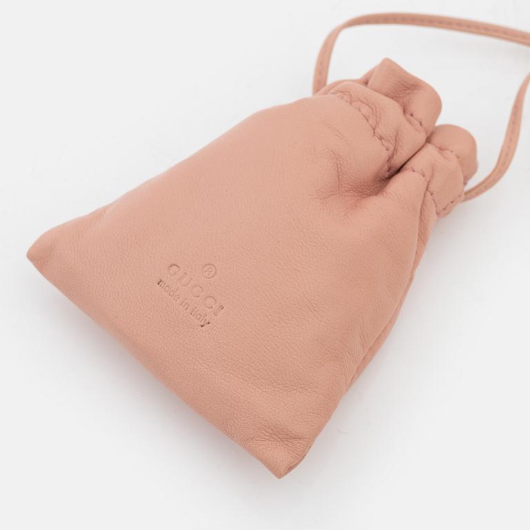 Gucci, a par of collarbags in pink and beige leather.