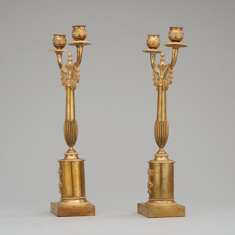 A pair of Swedish Empire early 19th century two-light candelabra.