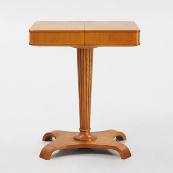 A Swedish Modern elm sewing table, Svenska Möbelfabrikerna, Bodafors, 1940's.