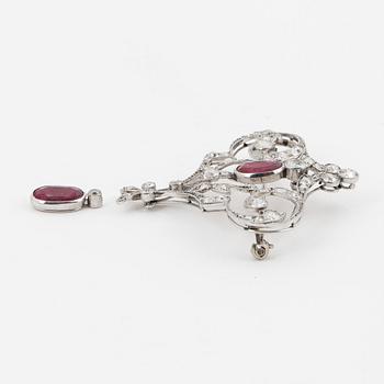 An old-cut diamond and ruby brooch.