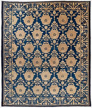 An antique Peking carpet, north China, c. 438 x 373 cm.