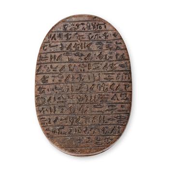 135. An Egyptian hardstone funerary scarab, probably Late Period, 26th-30th Dynasties, circa 664-343 B.C.