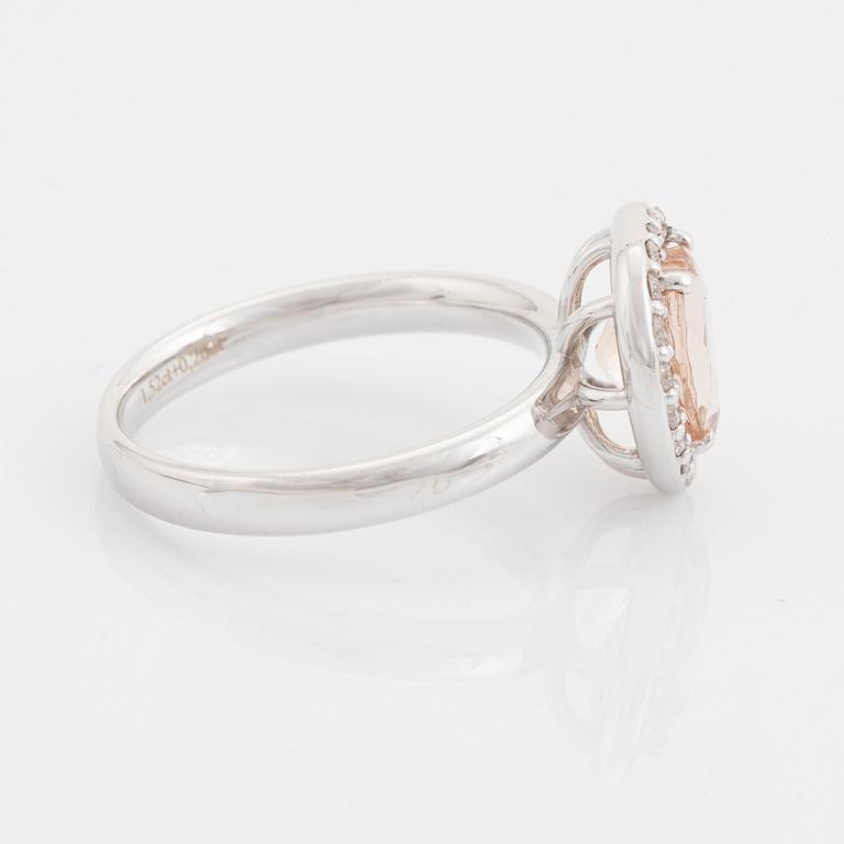 Heart shaped morganite and brilliant cut diamond ring.