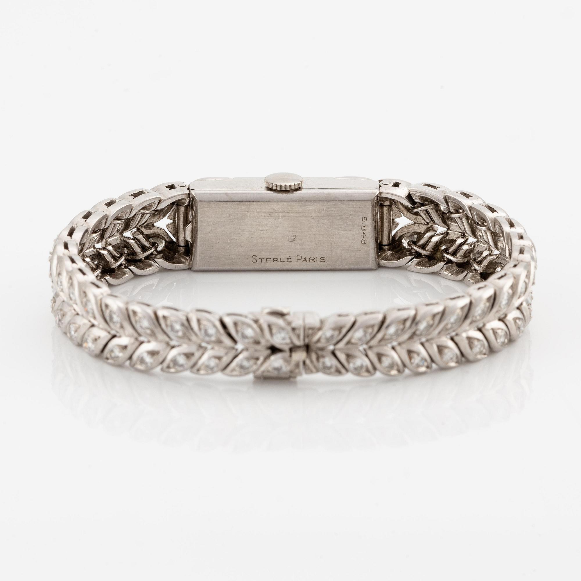 Sterlé armbandsur platina med runda briljantslipade diamanter.