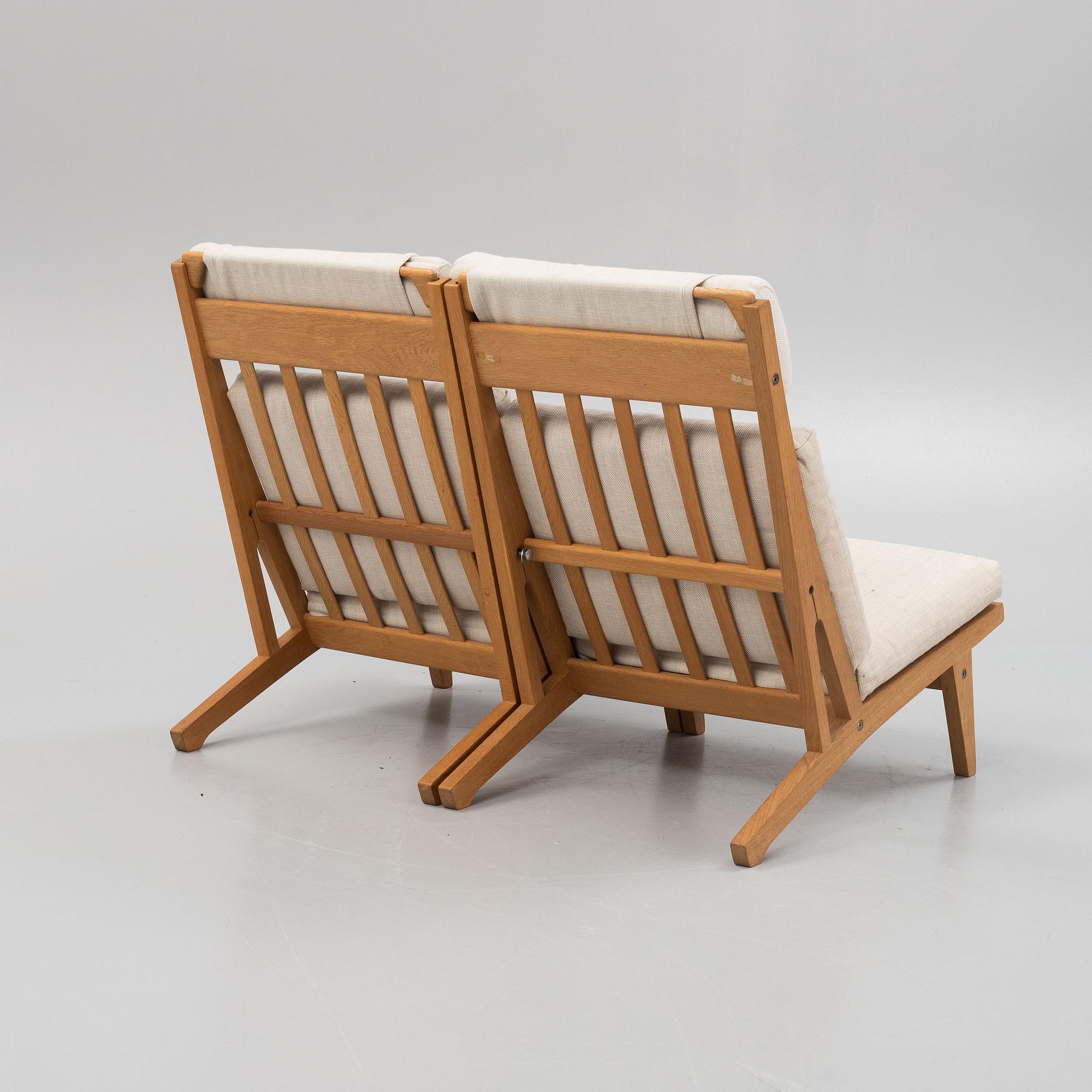 Hans J. Wegner, a pair of "GE375" lounge chairs/sofa, Getama, Denmark, 1970's.