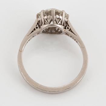 A platinum ring set with an old-cut diamond ca 2.25 cts quality ca K/L vs.