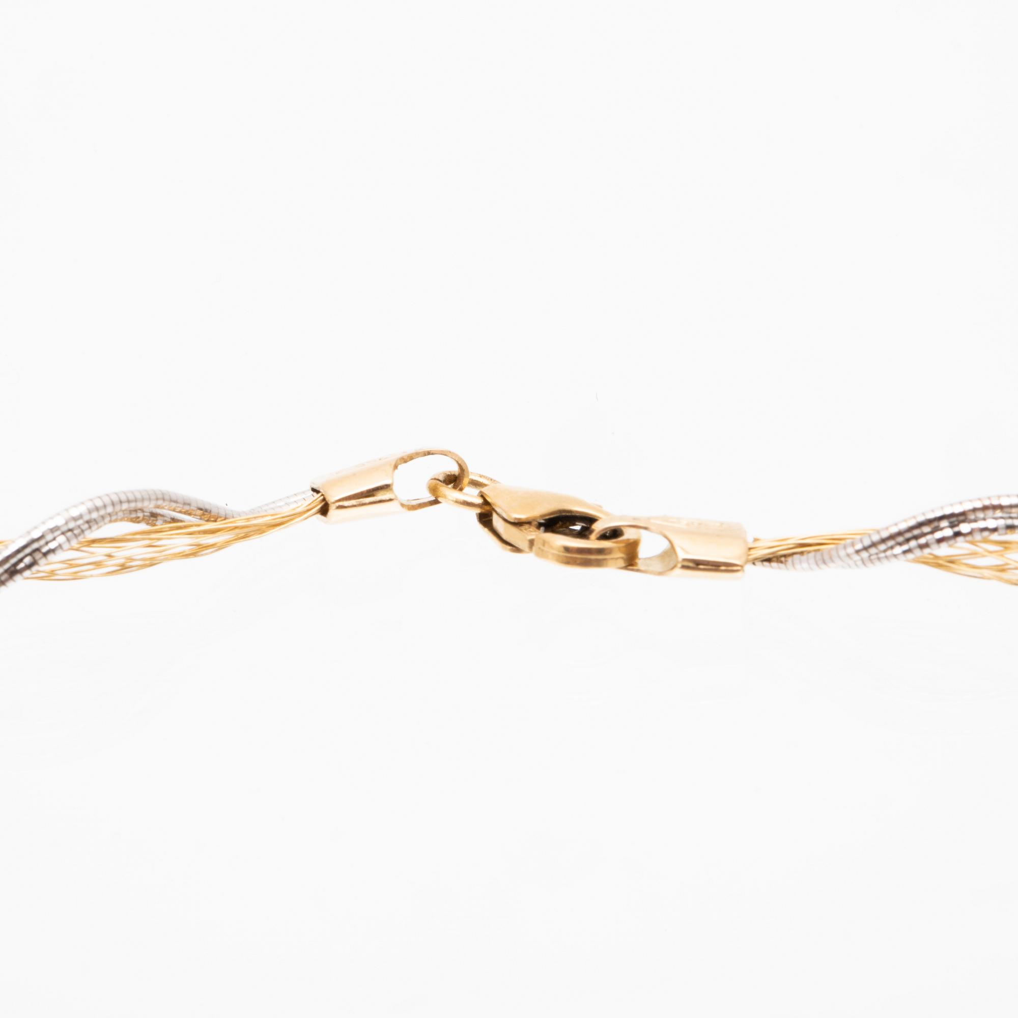 An 18K white and red gold necklace.