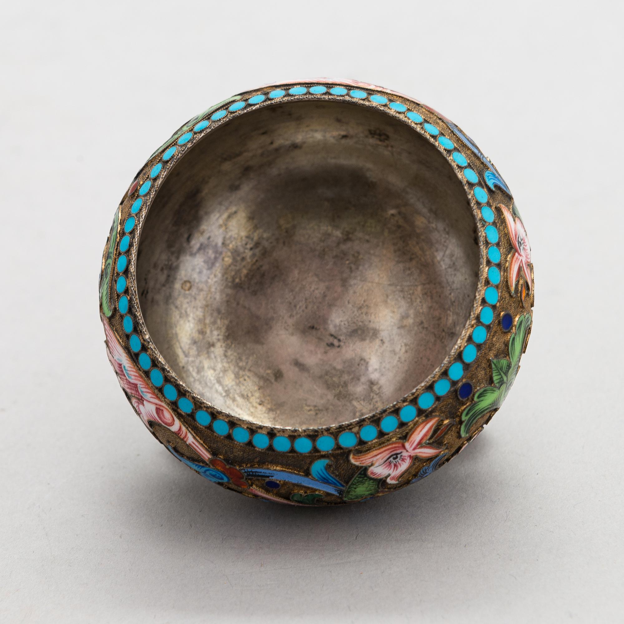 A salt cellar, mark of D. Nikitin, and 2 spoons, poss. P. Abrosimov and M. Andreyevna, enamel, silver. Moscow 1899-1908.