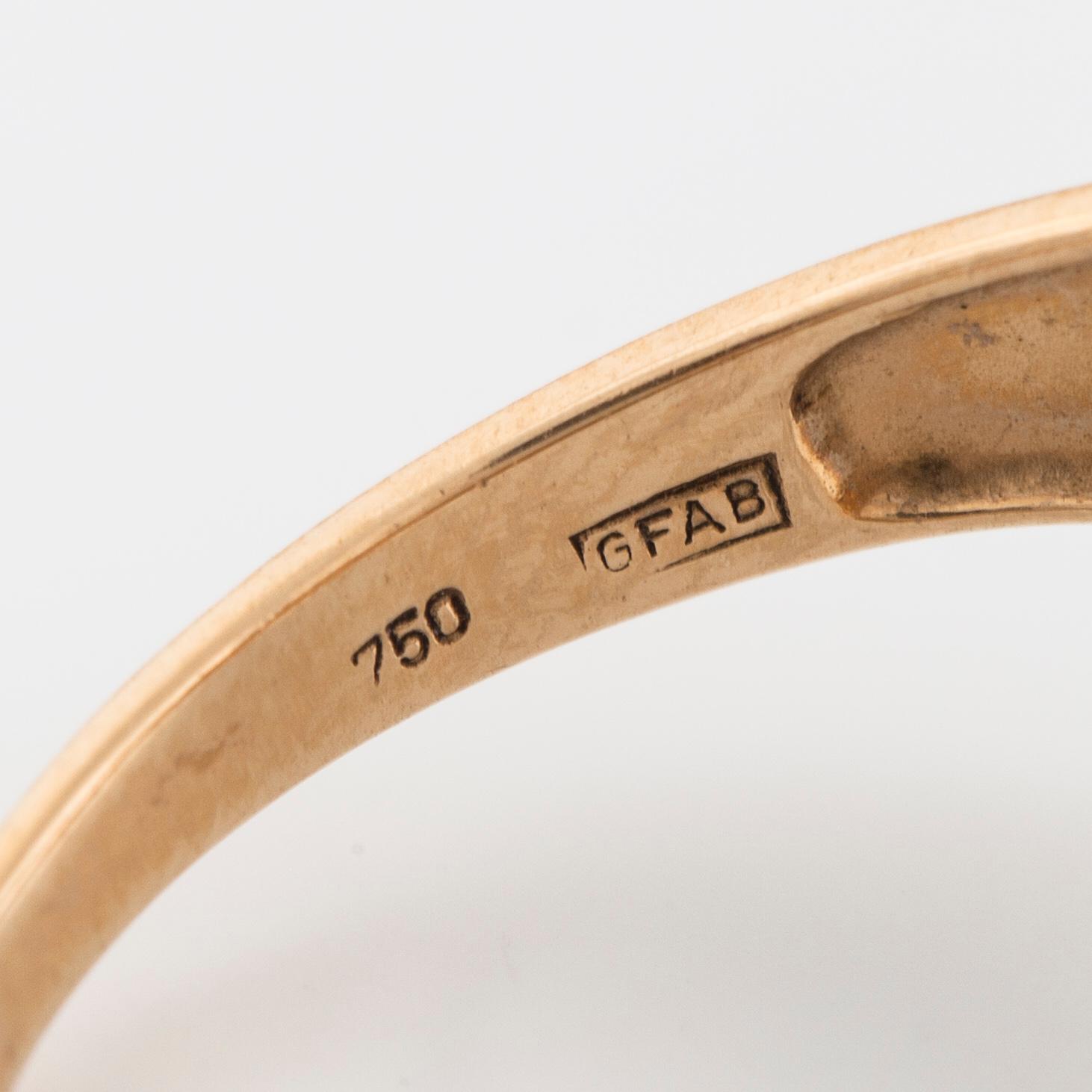 A single cut diamond ring.