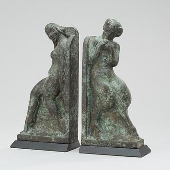 A pair of Axel Gute patinated metal bookends, Sweden 1919.