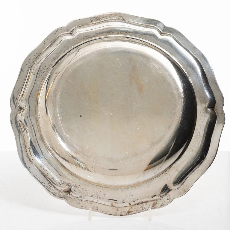 A set of seven silver plates (6+1), including GAB, Stockholm 1943.