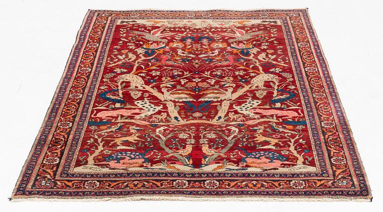 A semi-antique pictoral Doroksh rug, North-East Persia (Iran), ca 200 x 131 cm.