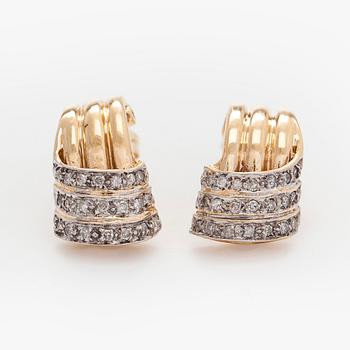 Korvakorut, 14K kultaa ja timantteja.