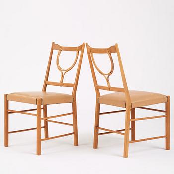 Josef Frank, a set of four cherry wood chairs, Svenskt Tenn, Sweden 1950s-1960s, model 2238.