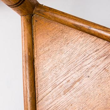 A pair of early 20th Century carved oak armchairs.