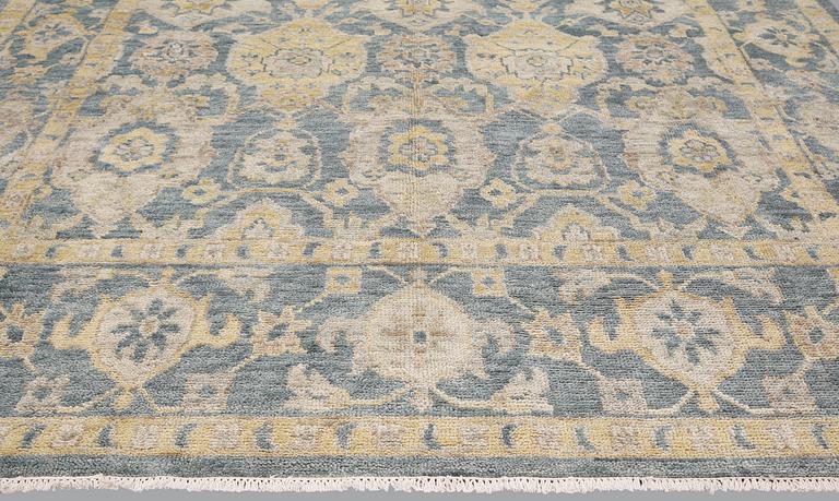 An oriental carpet, ca 425 x 300 cm.