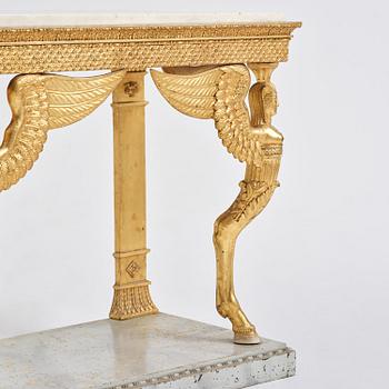 A late Gustavian giltwood console in the manner of J. Frisk, Stockholm, early 19th century.